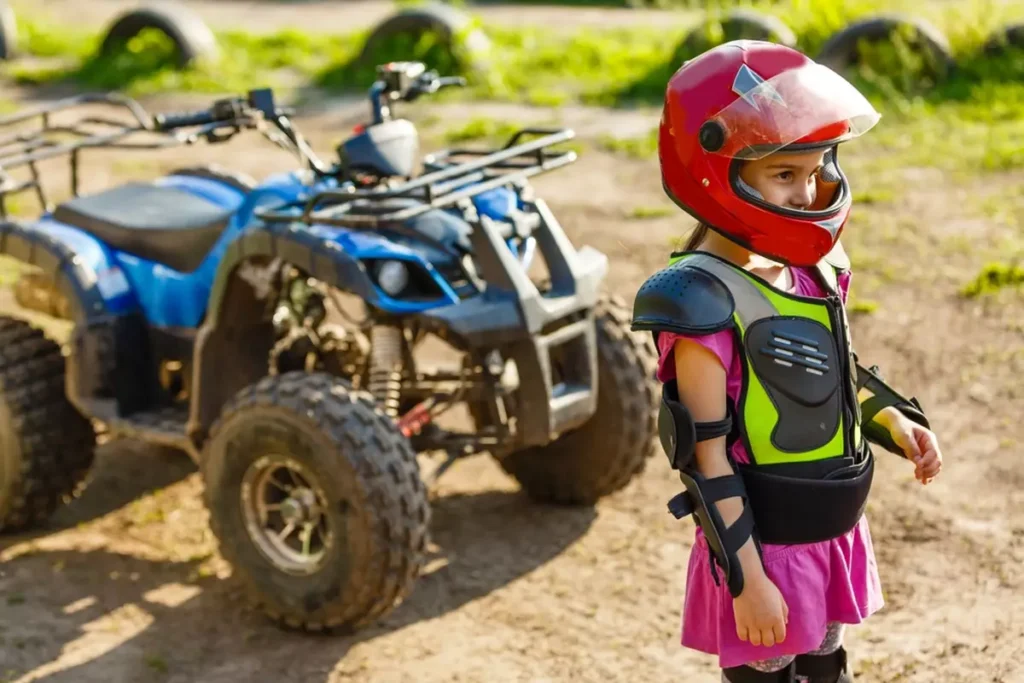 Kid riding an ATV